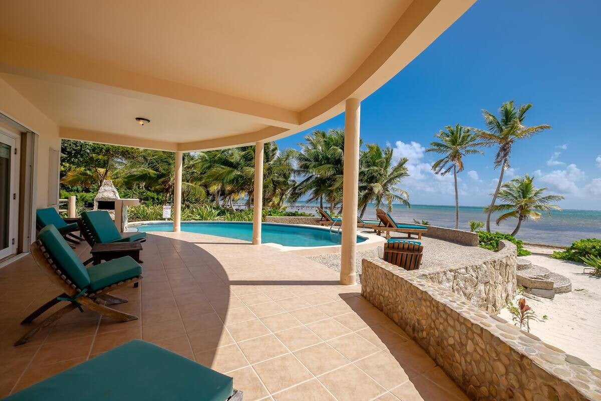 Spacious 2 Story Beachfront Home + Pool, Caretaker