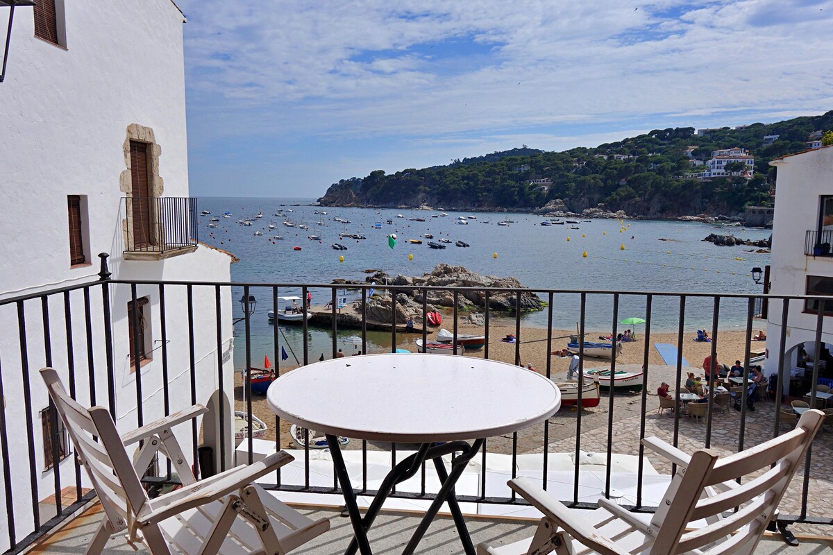 House on the first line of the sea on the beach of