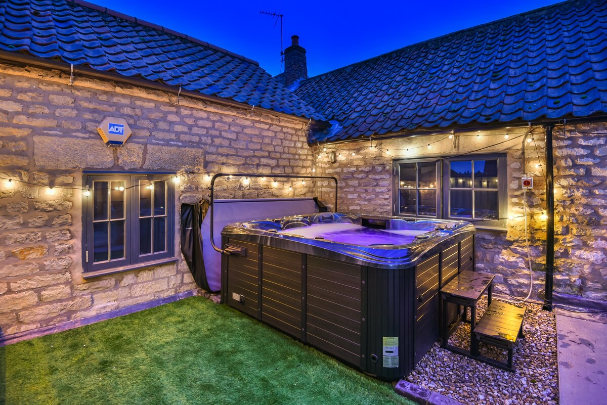 配备热水浴缸的私人花园屋顶露台