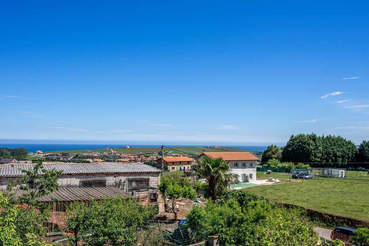 Casa con jardín cerca de la playa - El porton