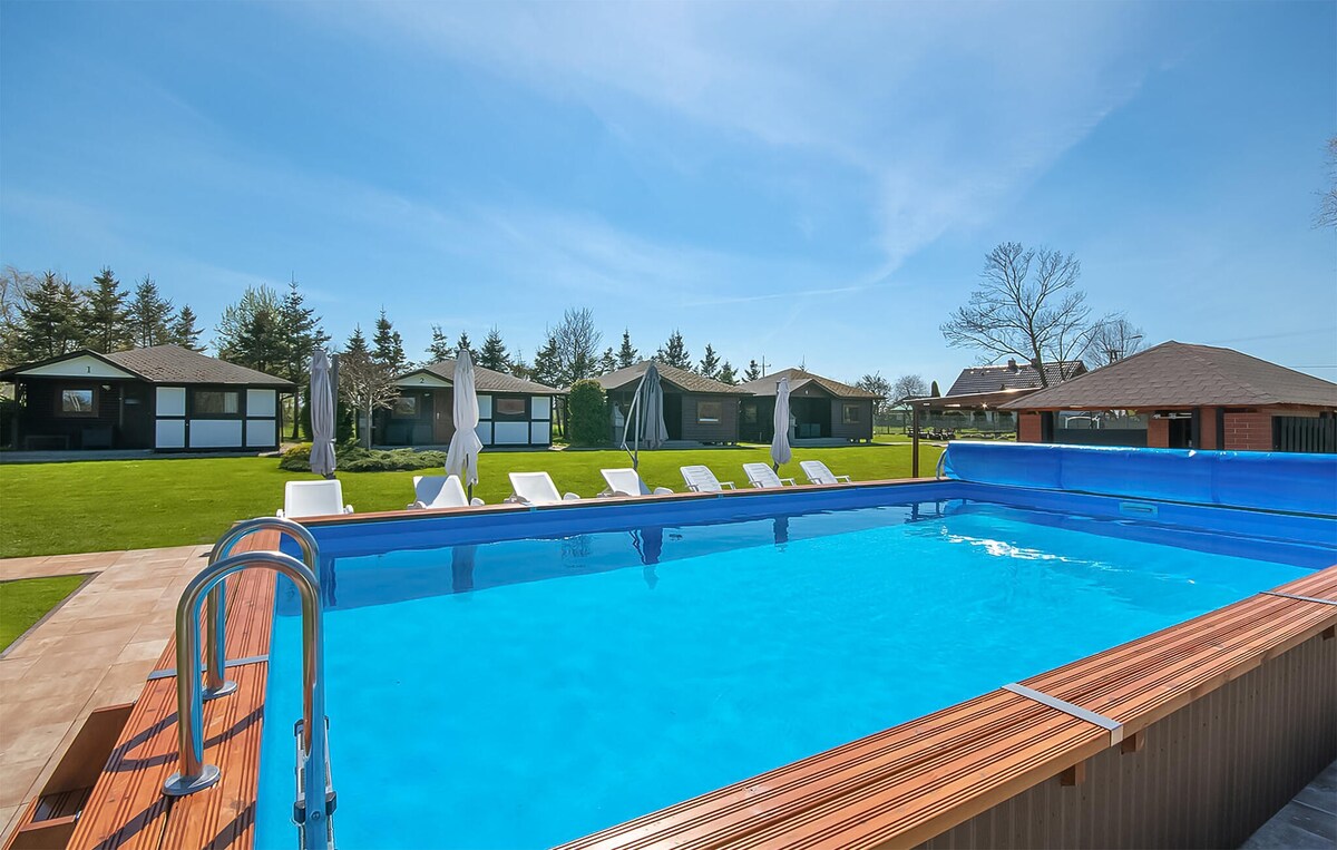 Nice home in Postomino with heated swimming pool