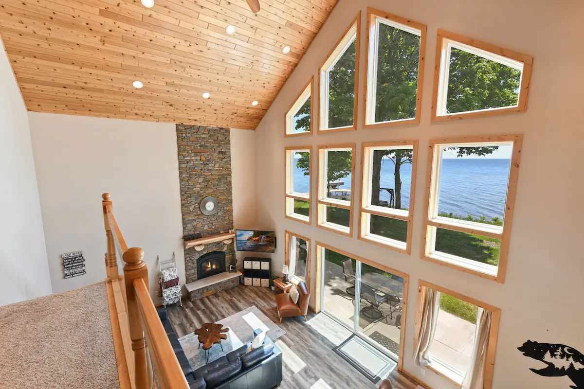 Lakefront cabin w/ wall of windows and game room!