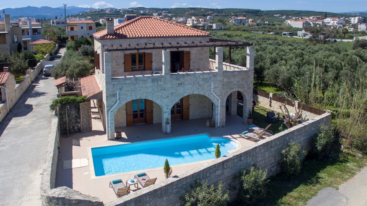 Luxury stone villa with big private pool at beach