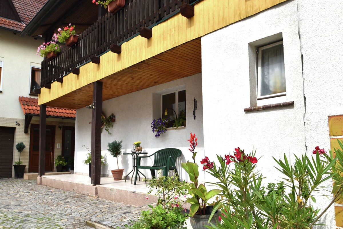Holiday home in Thuringia with private terrace, use of a garden and pool