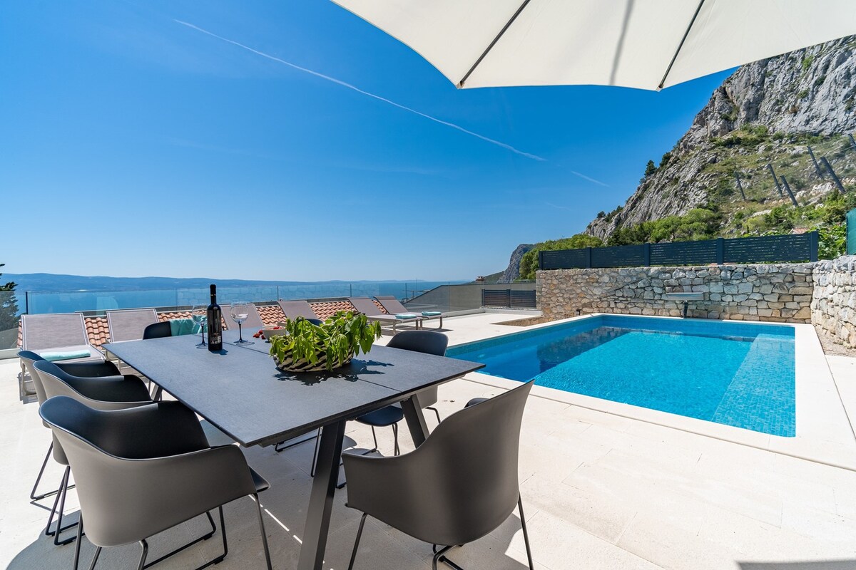Villa Atopos with heated pool,panoramic sea views