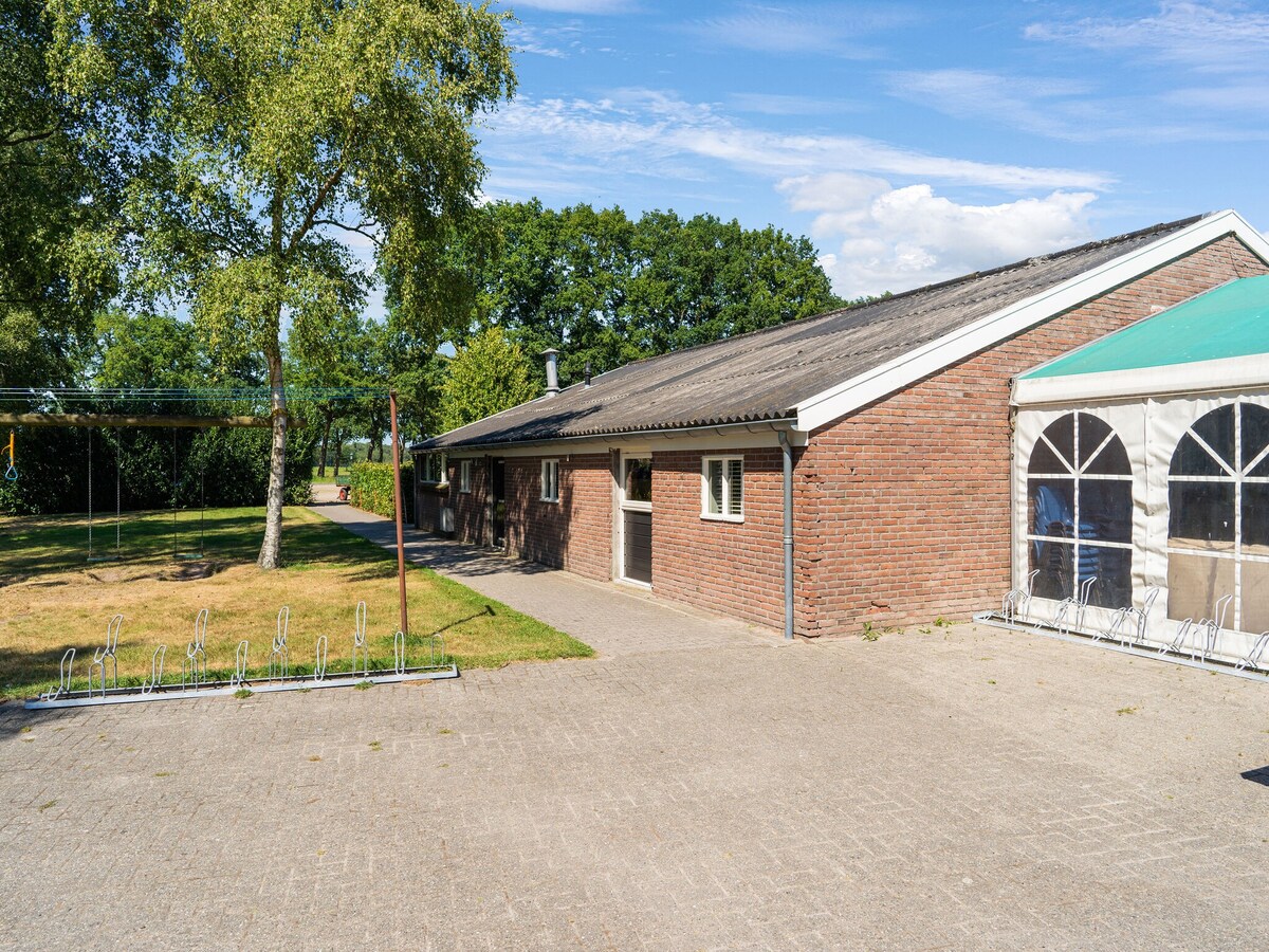 Large group house in Drenthe with bar and playing field
