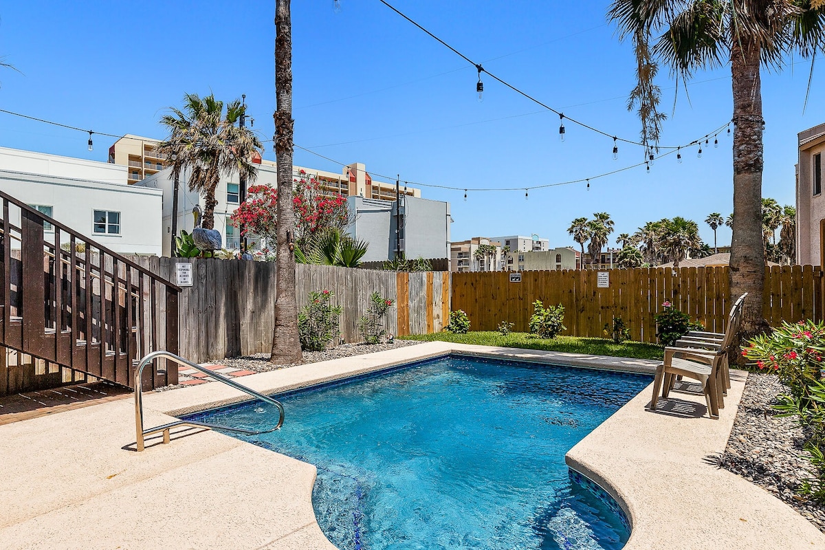 Luxury vacation getaway at Padre Parade. Private heated pool. Dog friendly!