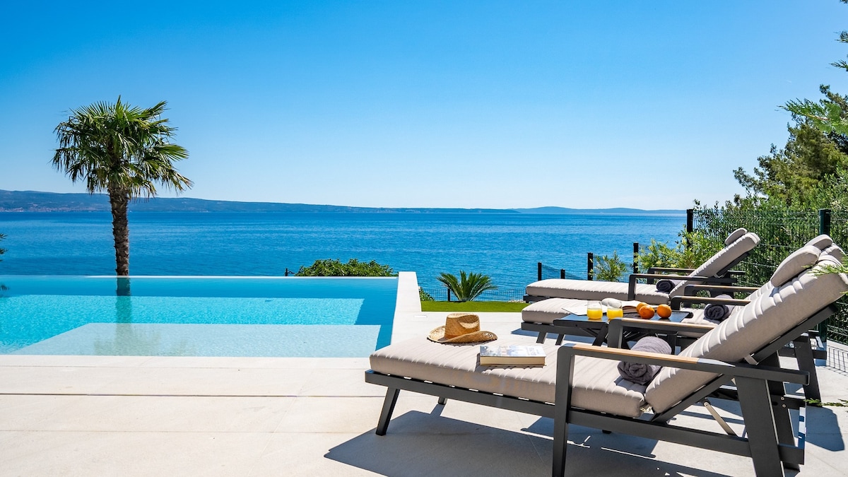 Seaview Villa ABA with heated pool,150m from beach
