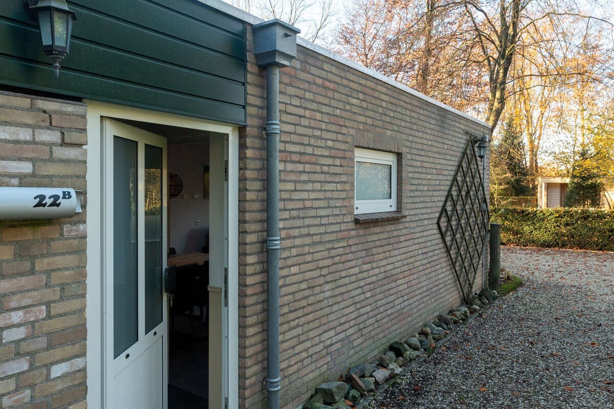 Nice bungalow with washing machine at a holiday park in a natural area