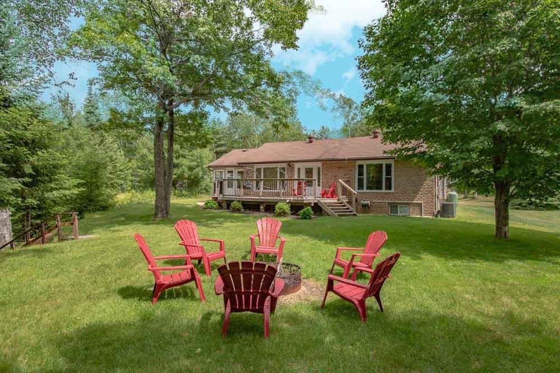 Modern Waterfront Cottage w/ Swimming & Hot Tub!