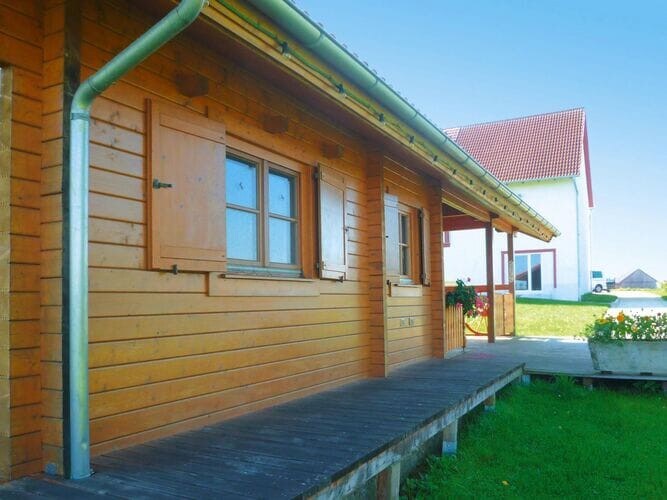 Holiday home with pool and sauna in Kanzach