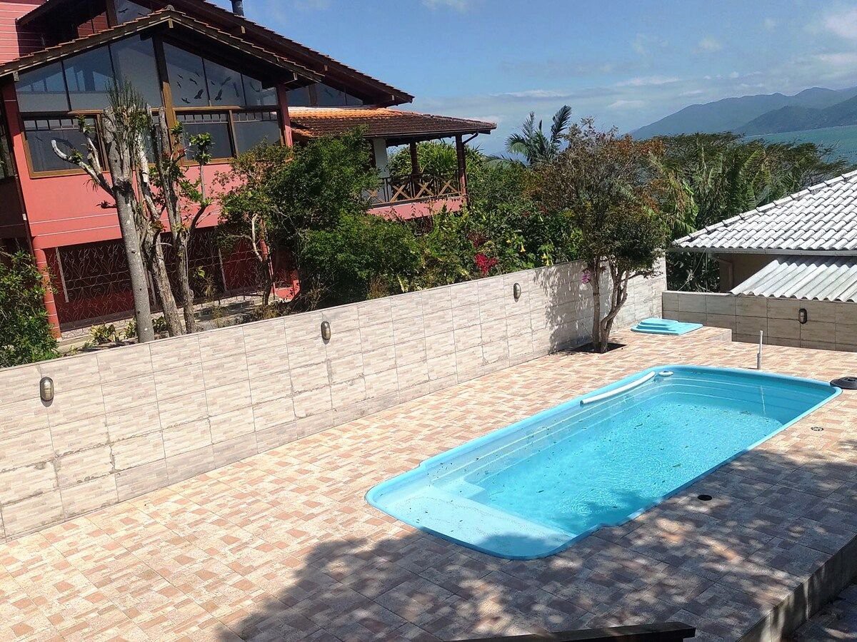 Casa  beira-mar com piscina e vista pôr do sol