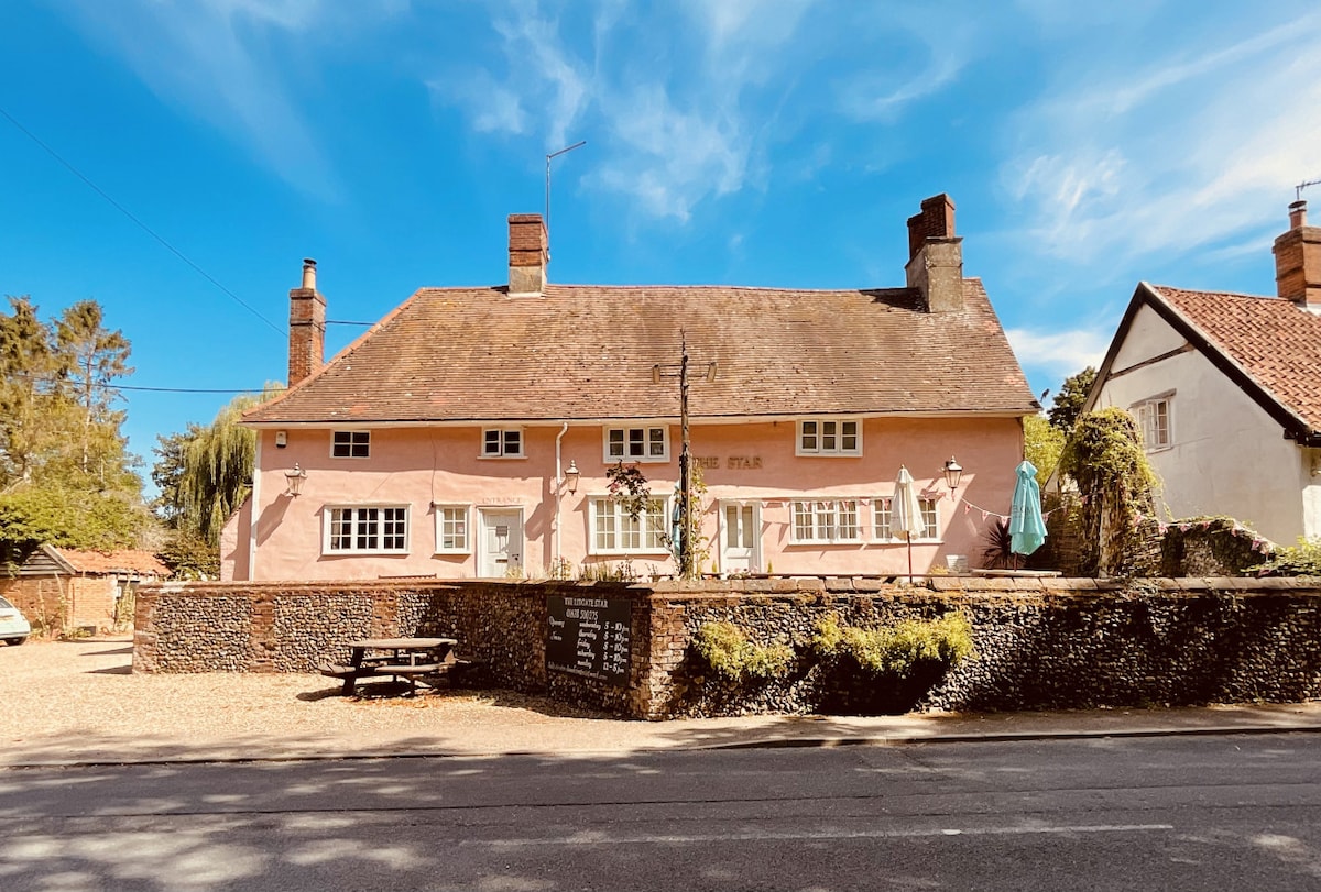 Eco-friendly cabins next to a 16th century pub