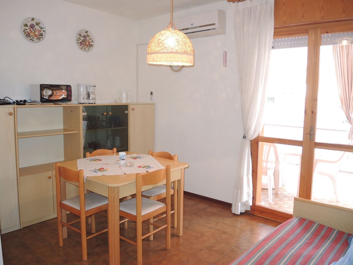 Warm two-room flat with terrace near the beach