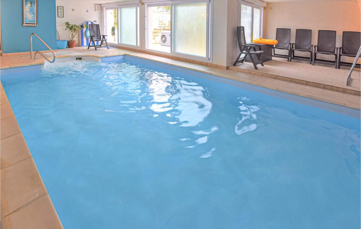Home in Ver-sur-Mer with indoor swimming pool