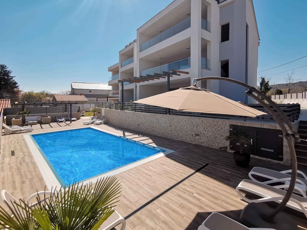 Holiday apartment with outdoor pool