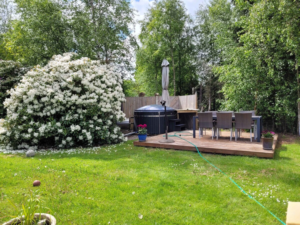 Lovely holiday home with spa and hot tub outside