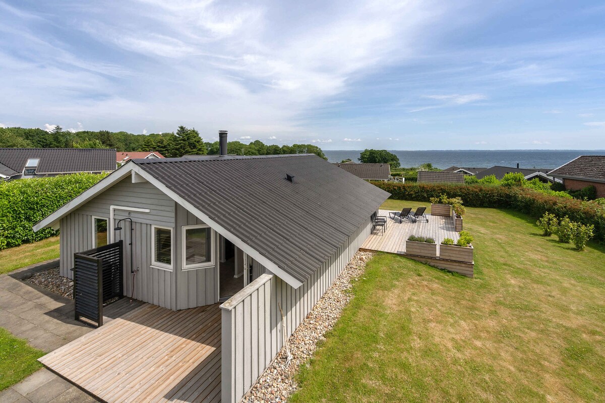 Holiday home with sauna, hot tub and sea view