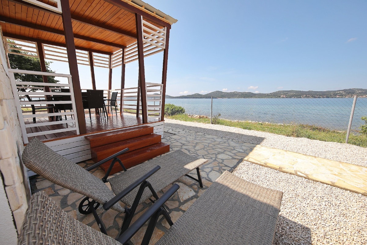 Two Bedroom House, beachfront in Biograd