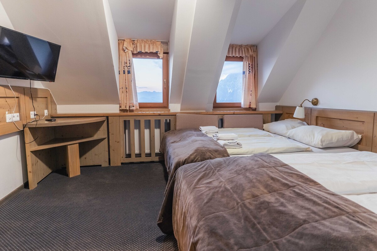 Quadruple Room with balcony in Krvavec resort