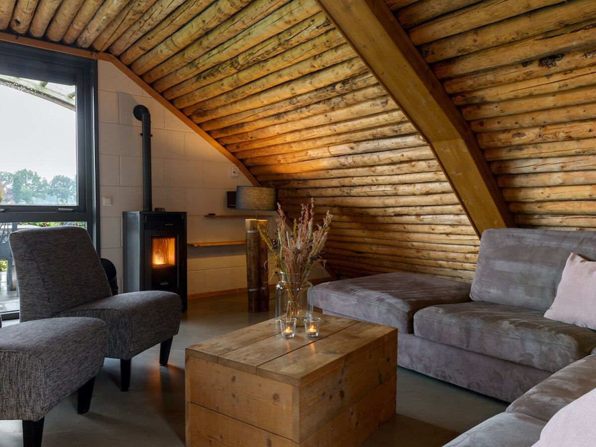 Bungalow with decorative fireplace, on farm