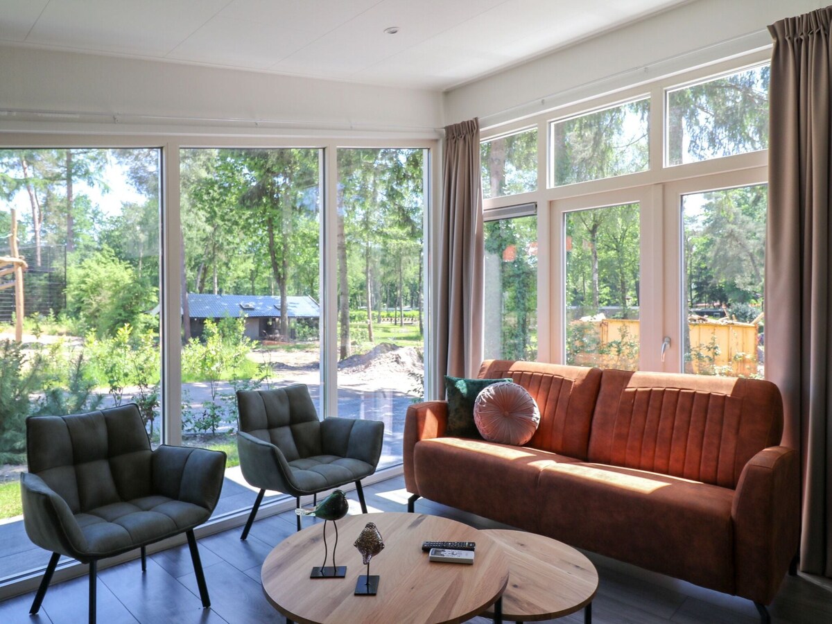 Modern chalet with AC, located at a playground