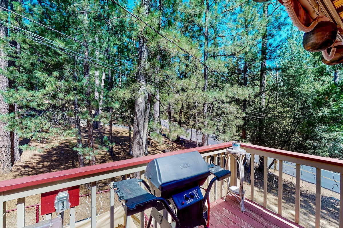 Forest-view home with private hot tub & fireplace