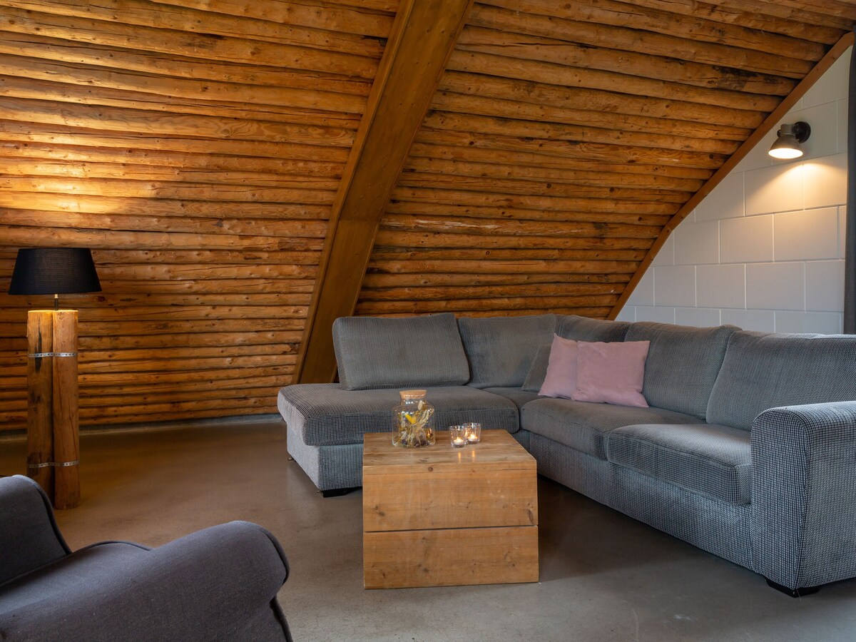 Bungalow with decorative fireplace, on farm