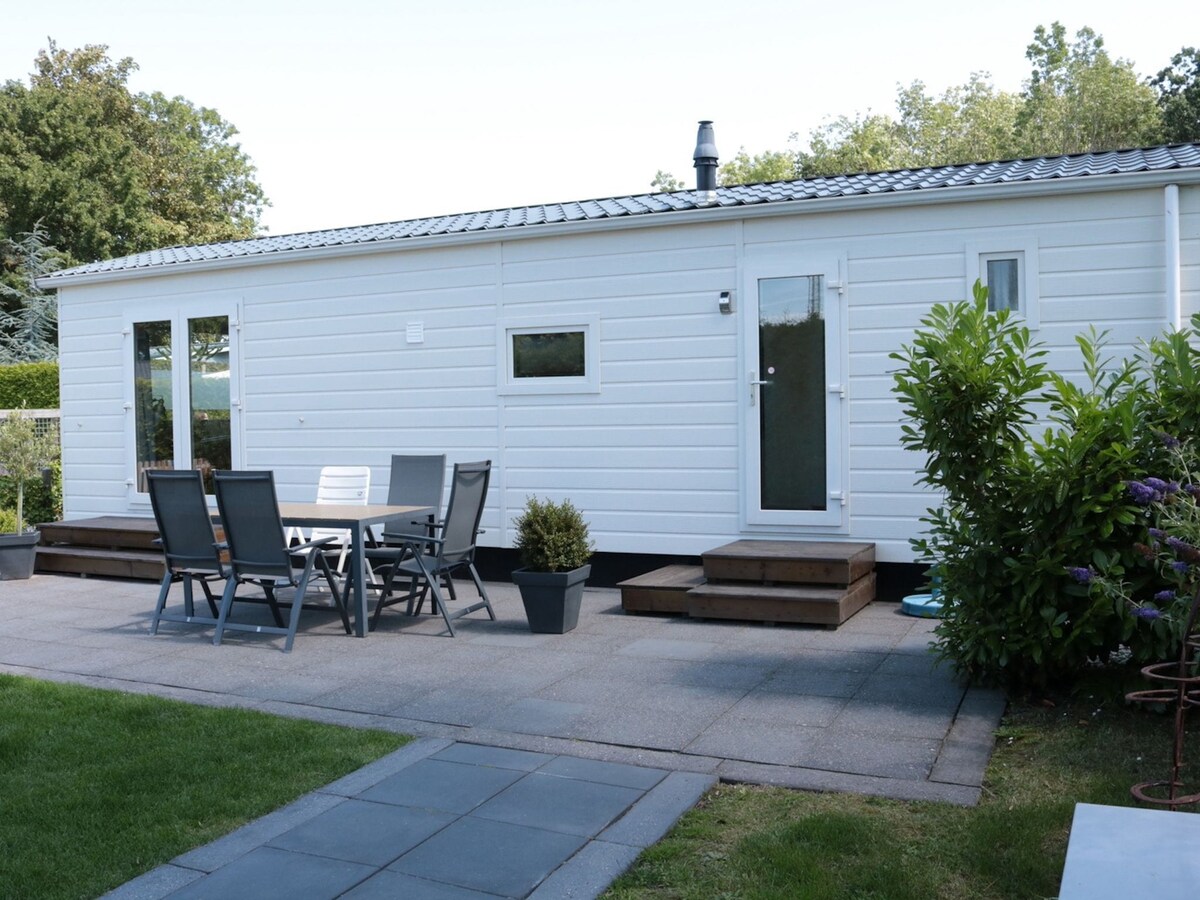 Tidy chalet with a microwave, near the Wadden Sea