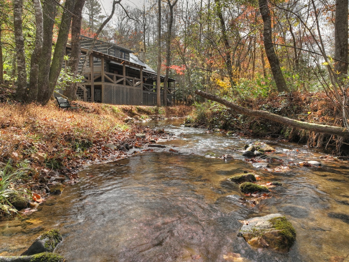 Just One More Night is a lovely creek-front cabin